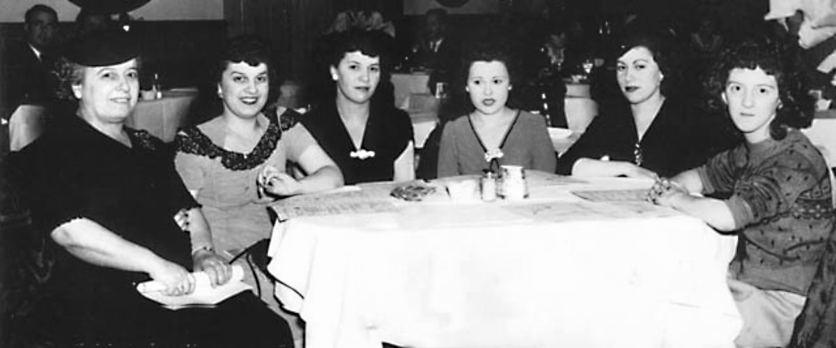 vintage photo of ladies gathered at a table